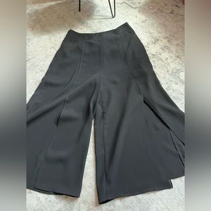 Black flare palazzo pants with slits at bottom. Worn once!